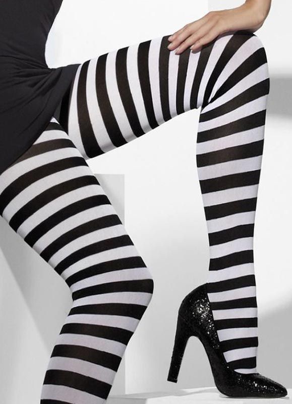 A woman with black and white striped stockings - a Royalty Free